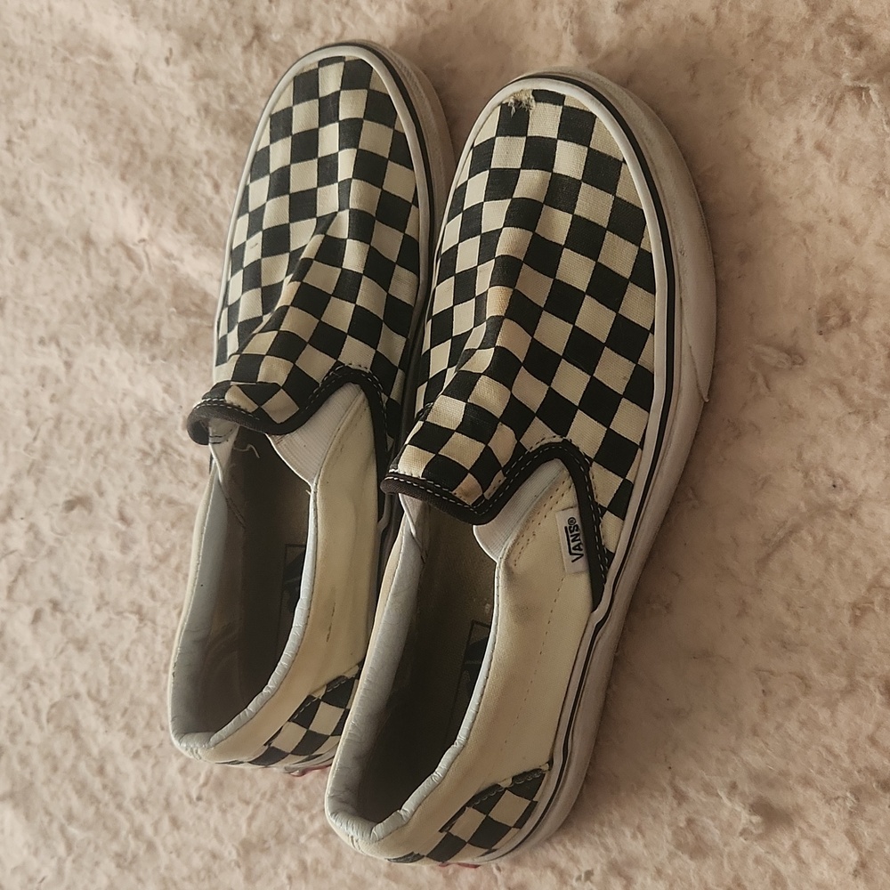 Checkerboard Vans slip ons